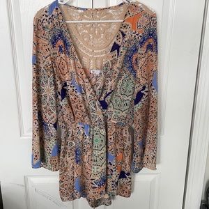 ROMPER w/LONG SLEEVES, SMALL , multi colored , low cut front